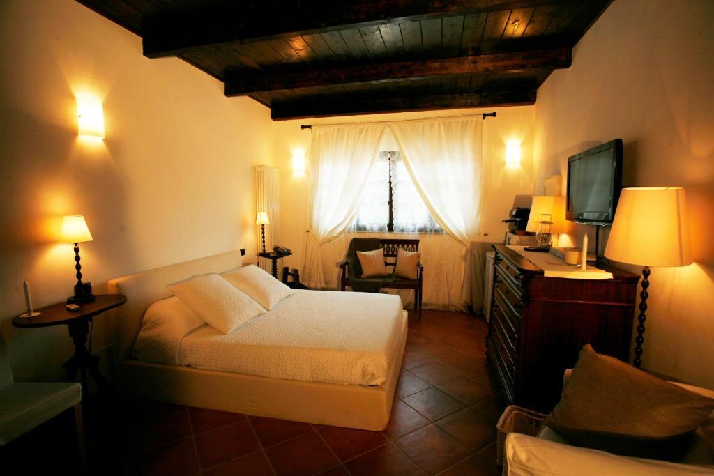 La Maragliana Aparthotel Castel Rocchero Стая снимка