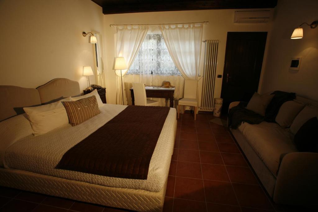 La Maragliana Aparthotel Castel Rocchero Стая снимка